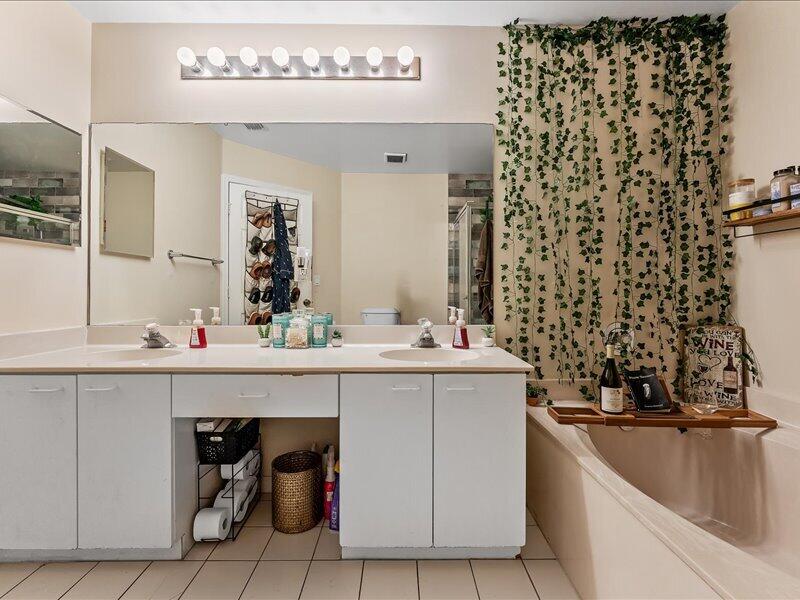 20970 Via Alamanda Boca Raton, FL 33428 - Photo 25 of 51 a kitchen with a sink and a refrigerator