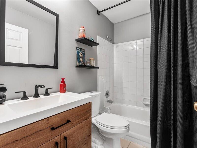 20970 Via Alamanda Boca Raton, FL 33428 - Photo 29 of 51 a bathroom with a sink a toilet and shower