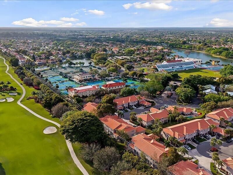 20970 Via Alamanda Boca Raton, FL 33428 - Photo 39 of 51 an aerial view of residential houses with outdoor space and parking