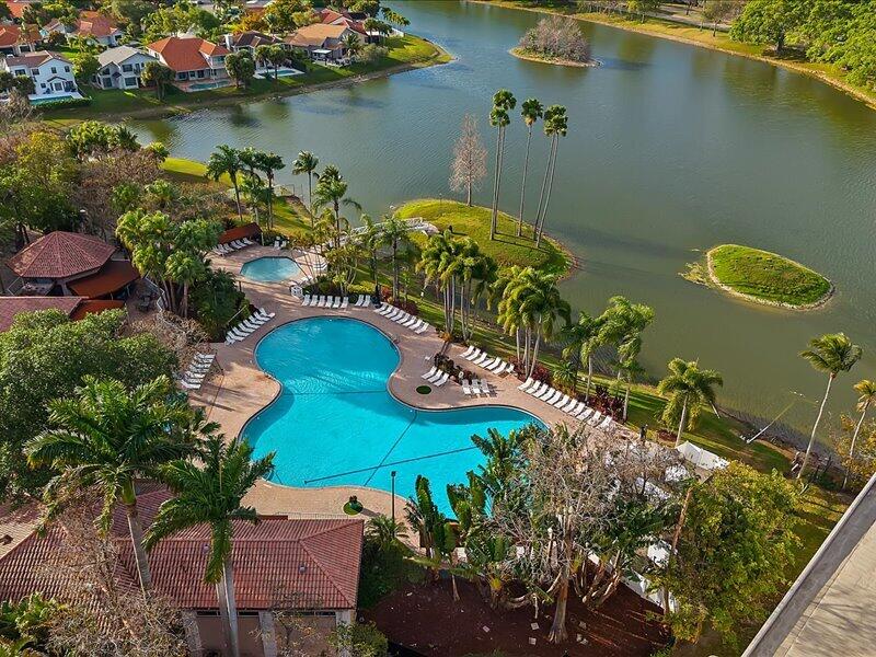 20970 Via Alamanda Boca Raton, FL 33428 - Photo 46 of 51 an aerial view of a house with a lake view