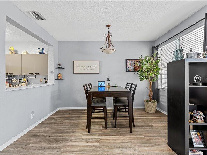 20970 Via Alamanda Boca Raton, FL 33428 - Photo 8 of 51 a view of a dining room with furniture and window