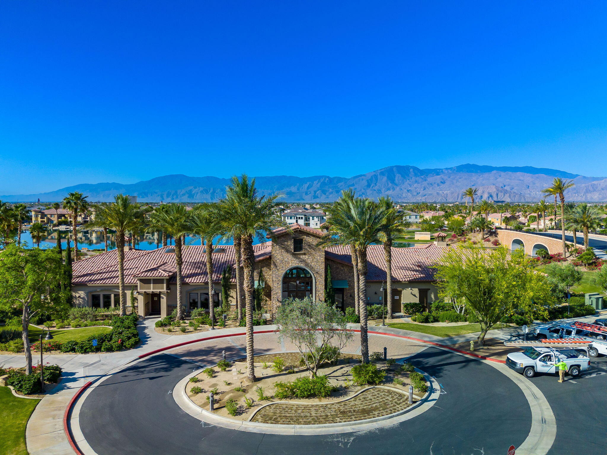 43760 Spiaggia Place Indio, CA 92203 - Photo 35 of 38 a view of a swimming pool with a table and chairs