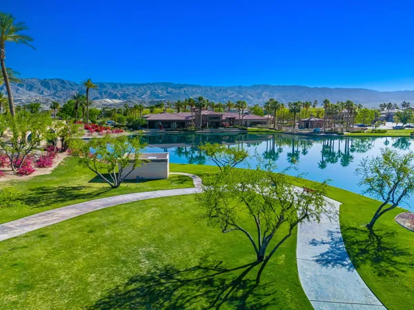 a view of a lake with a garden