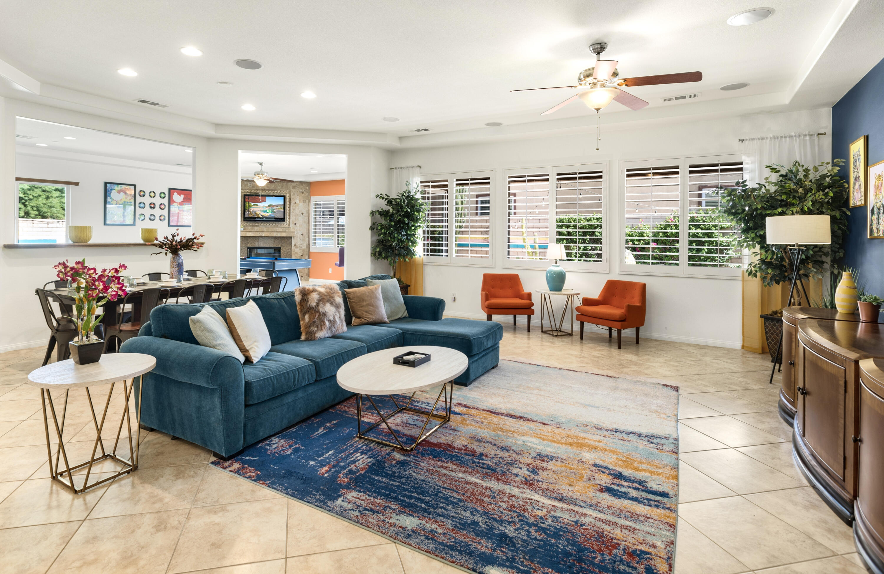 43760 Spiaggia Place Indio, CA 92203 - Photo 6 of 38 a living room with furniture potted plant and a large window