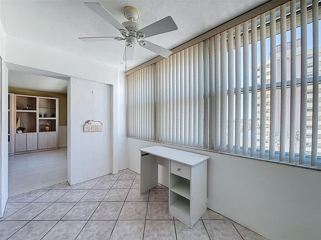 4550 Cove Circle, Unit 507 St. Petersburg, FL 33708 - Photo 19 of 32 a view of an empty room with a window