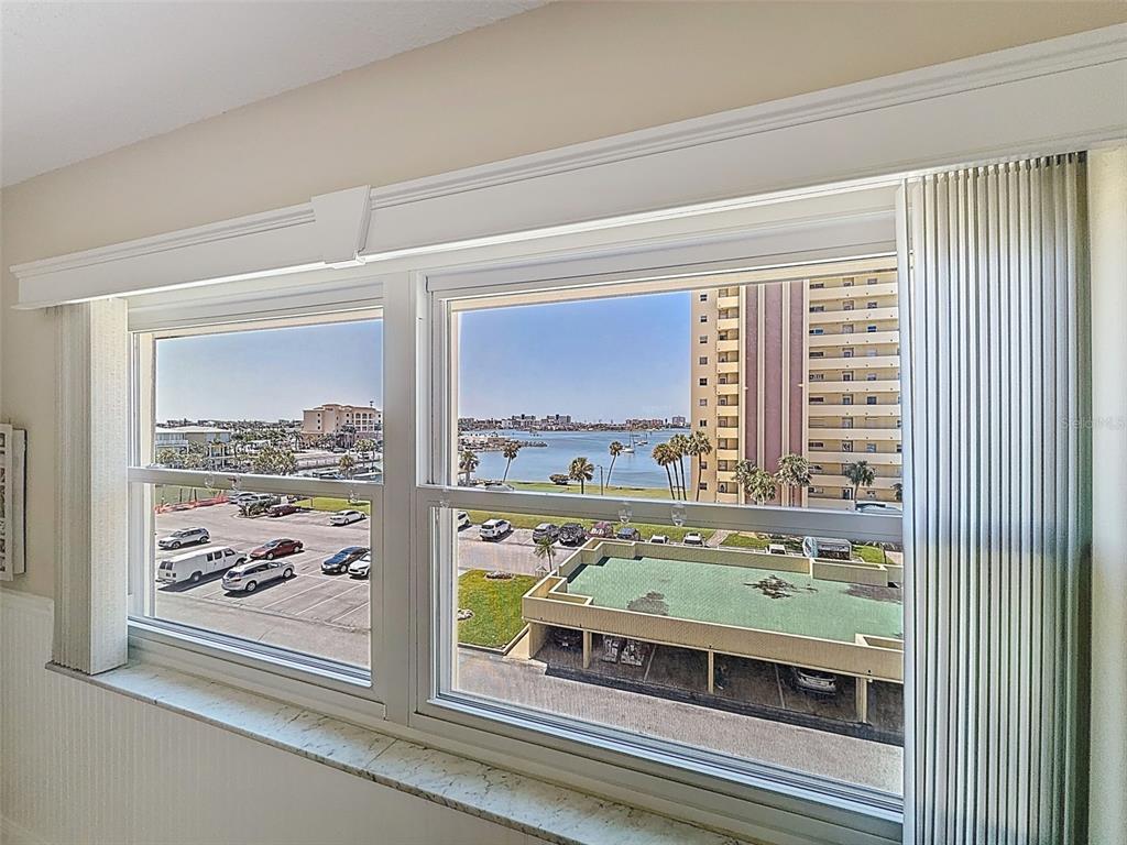 4550 Cove Circle, Unit 507 St. Petersburg, FL 33708 - Photo 3 of 32 a view of a living room and window