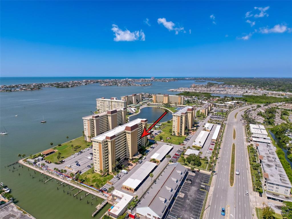 4550 Cove Circle, Unit 507 St. Petersburg, FL 33708 - Photo 31 of 32 an aerial view of a house with a ocean view