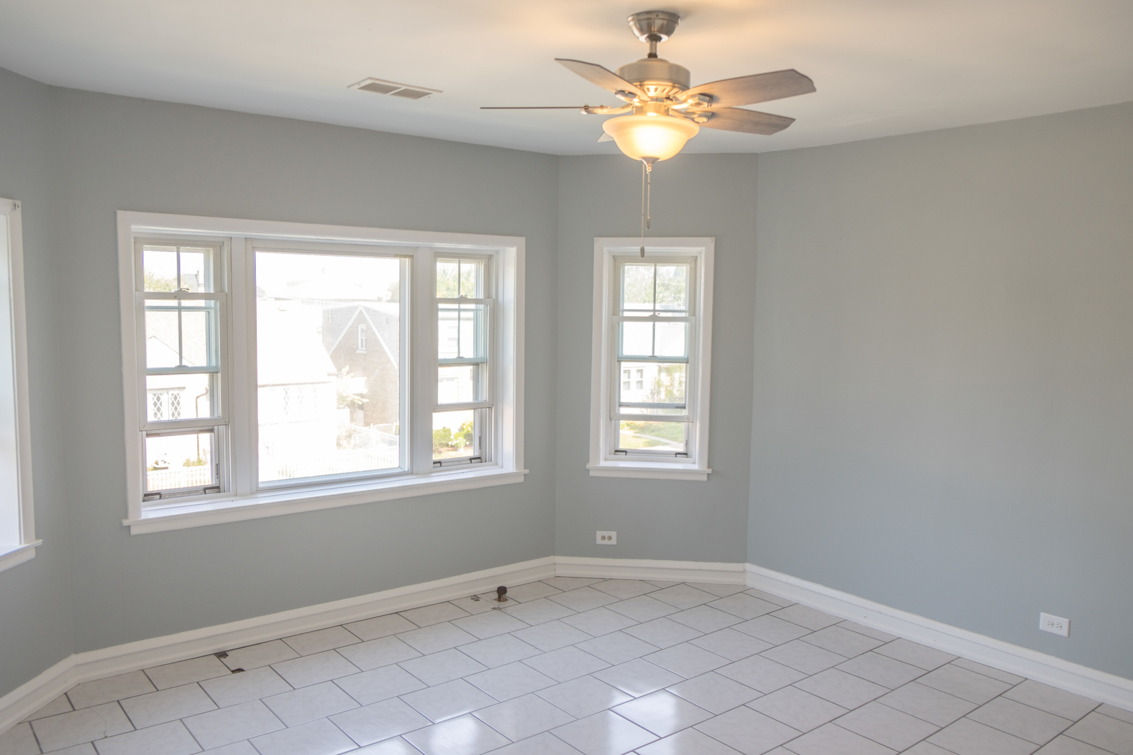 5445 West 64th Street, Unit 2 Chicago, IL 60638 - Photo 4 of 37 a view of an empty room with a window