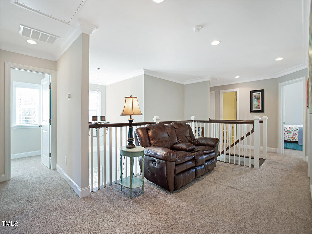 1109 Harrison Ridge Road Wake Forest, NC 27587 - Photo 53 of 86 a living room with furniture and a table