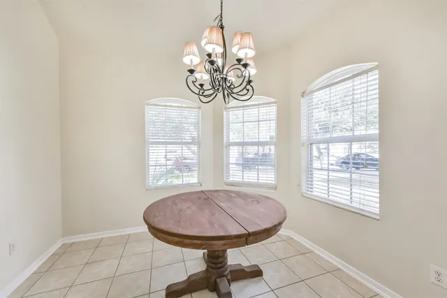 a view of dining room and window