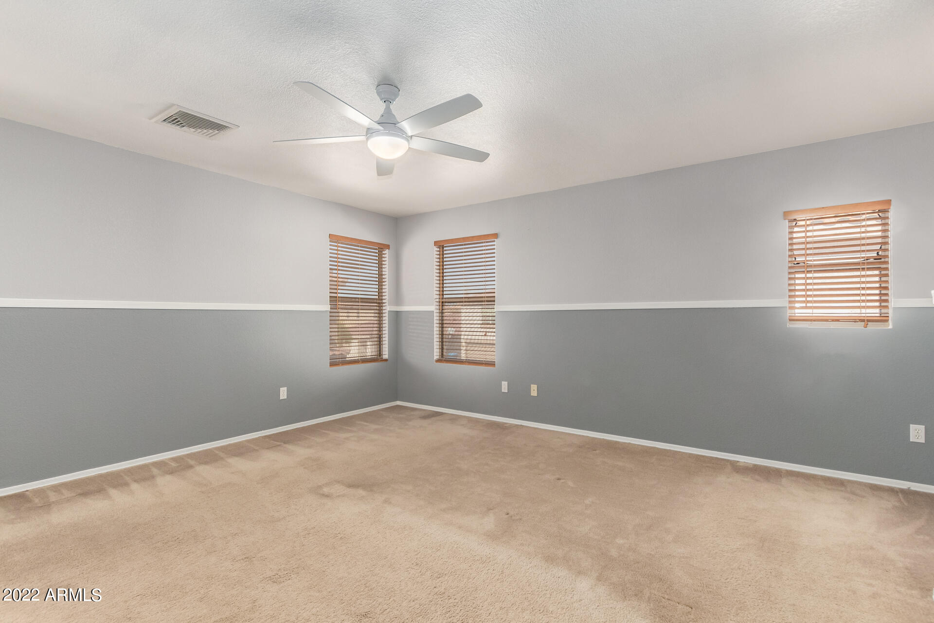 3307 South Bowman Road Apache Junction, AZ 85119 - Photo 13 of 28 a view of an empty room with a window