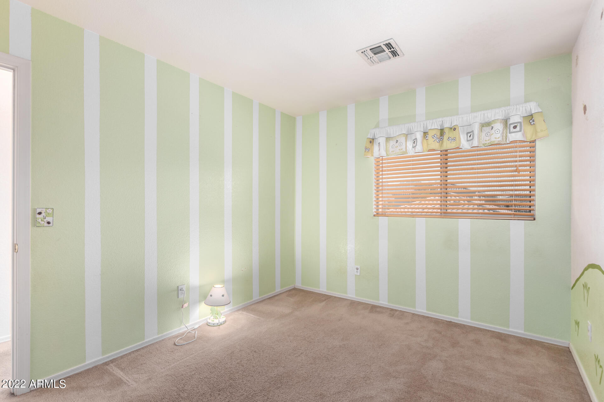 3307 South Bowman Road Apache Junction, AZ 85119 - Photo 21 of 28 a view of a room with a window