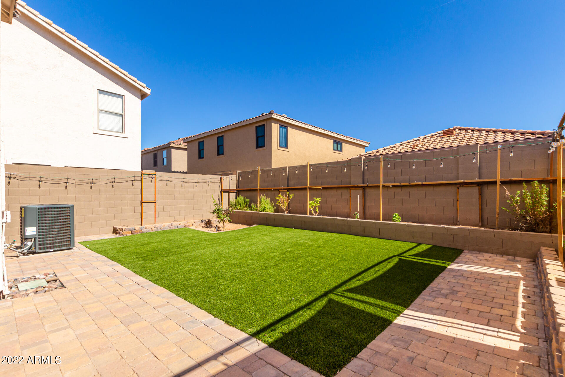 3307 South Bowman Road Apache Junction, AZ 85119 - Photo 25 of 28 a front view of a house with yard