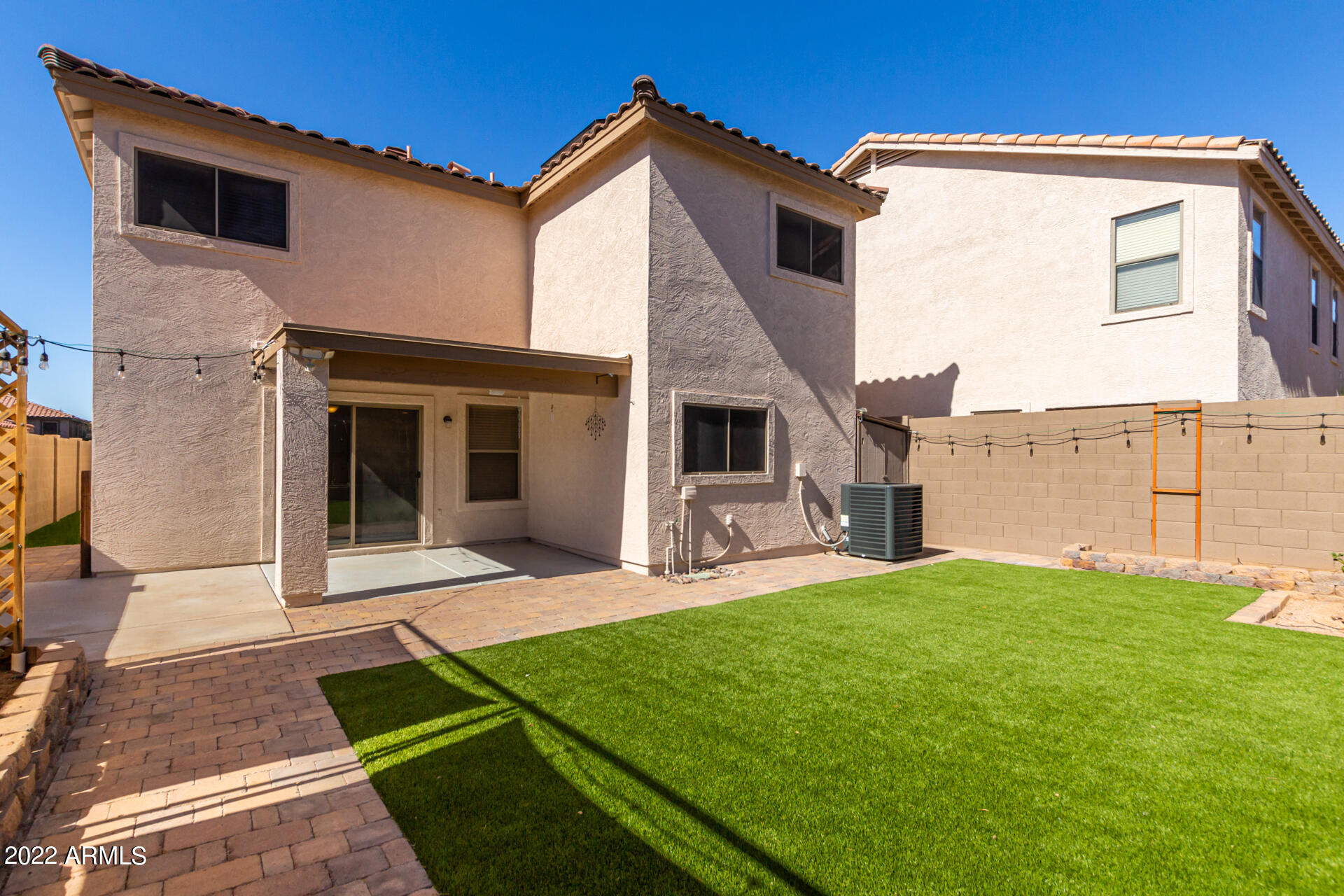 3307 South Bowman Road Apache Junction, AZ 85119 - Photo 26 of 28 a view of a house with a yard and sitting area