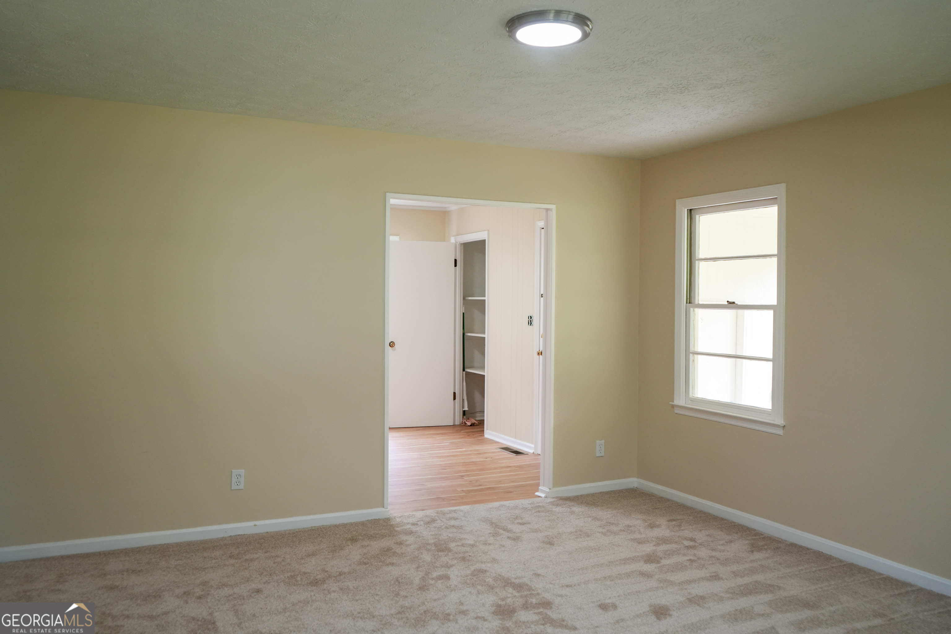 1869 Minter Blue Springs Road Rockledge, GA 30454 - Photo 18 of 45 an empty room with windows