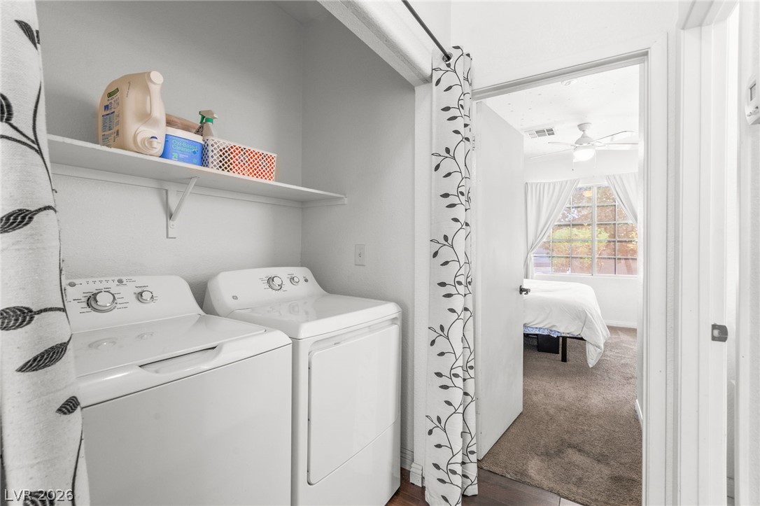 7353 Ridge Star Court Las Vegas, NV 89131 - Photo 27 of 36 A dedicated laundry space provides ultimate convenience, positioned just off a peaceful sleeping area.