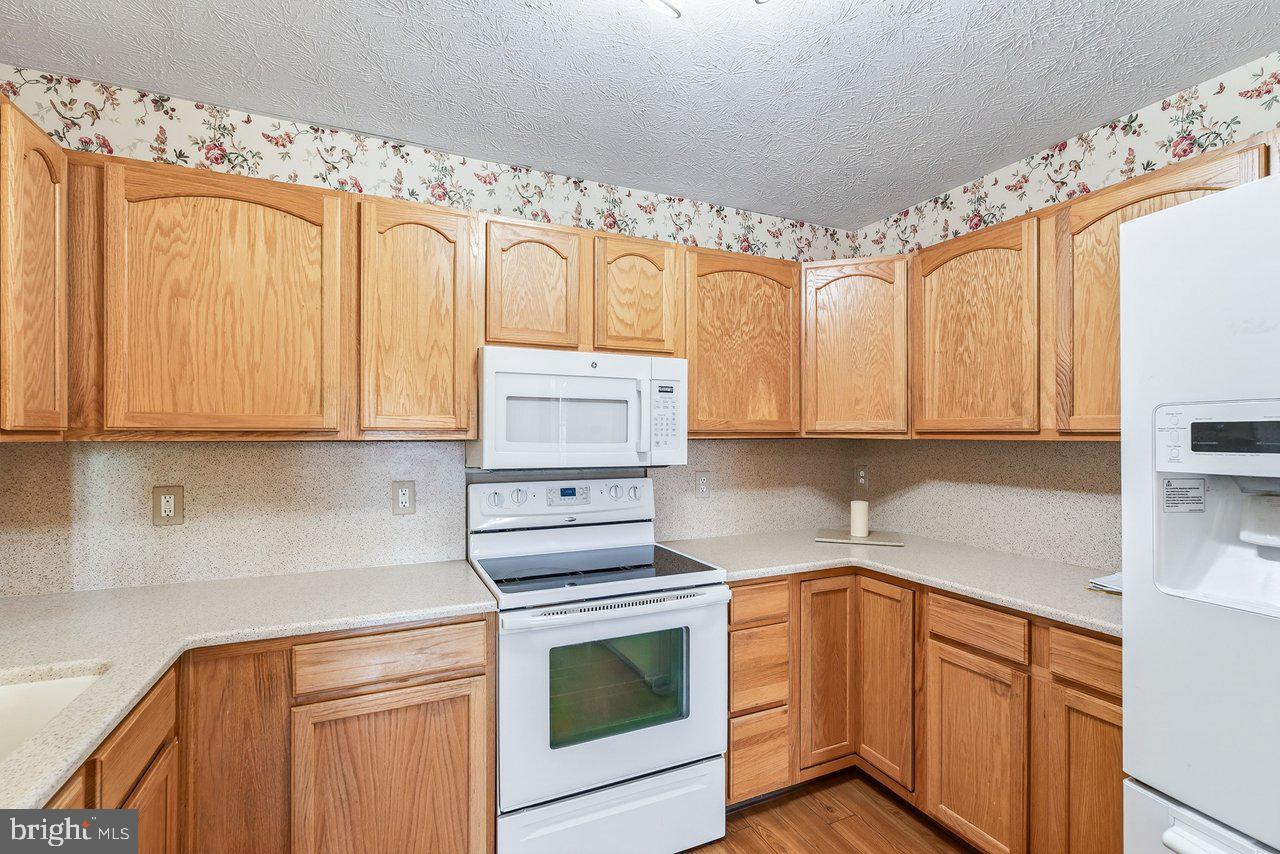 849 South Ox Road Woodstock, VA 22664 - Photo 13 of 51 Charming kitchen with warm wood tones.