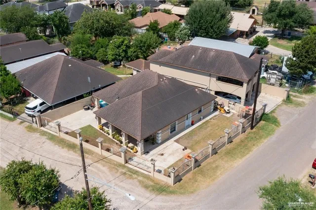 an aerial view of a house with street view