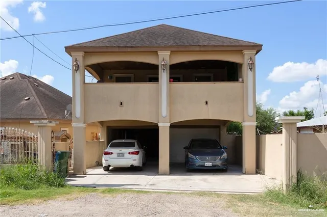 a car parked in front of a house