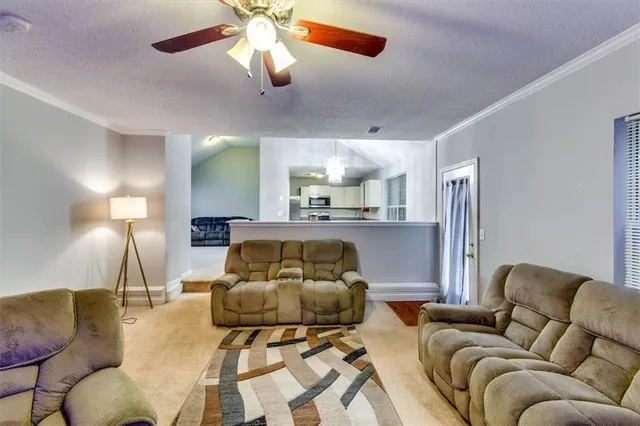 a bathroom with a granite countertop sink a mirror and a vanity