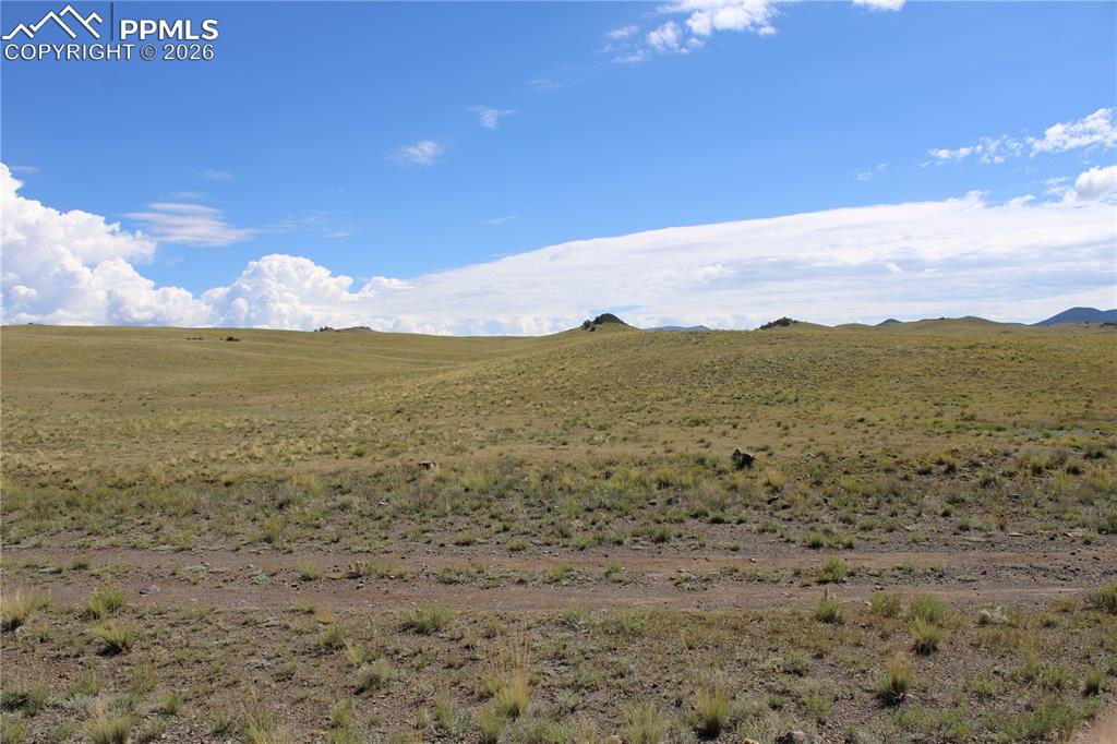 Caddo Road Hartsel, CO 80449 - Photo 2 of 9 a view of an ocean beach and mountain