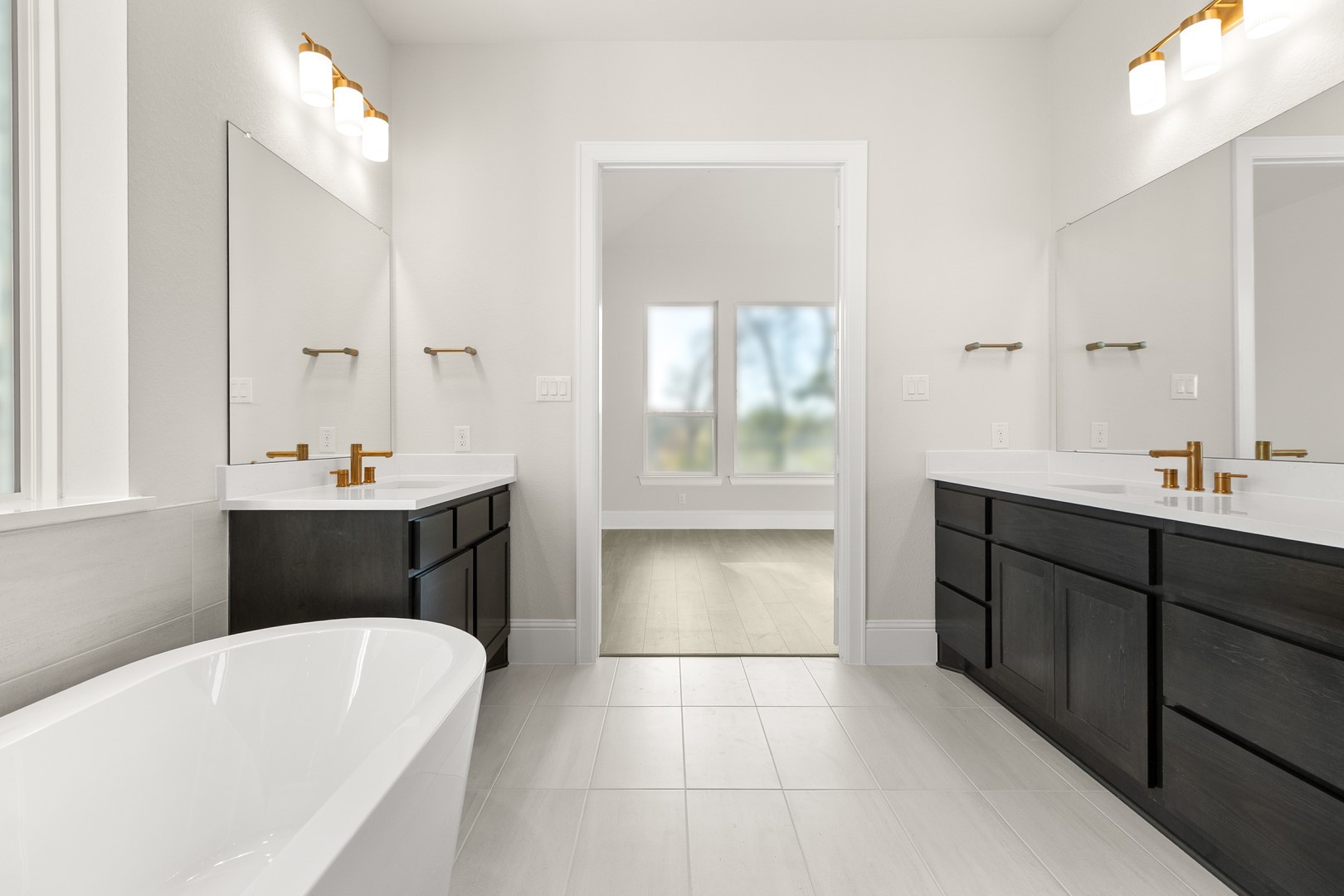 7914 Blue Dasher Pk Place Fulshear, TX 77441 - Photo 17 of 30 a bathroom with a tub sink shower and mirror