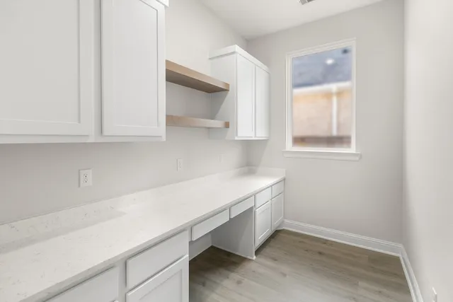 a room with storage and utility