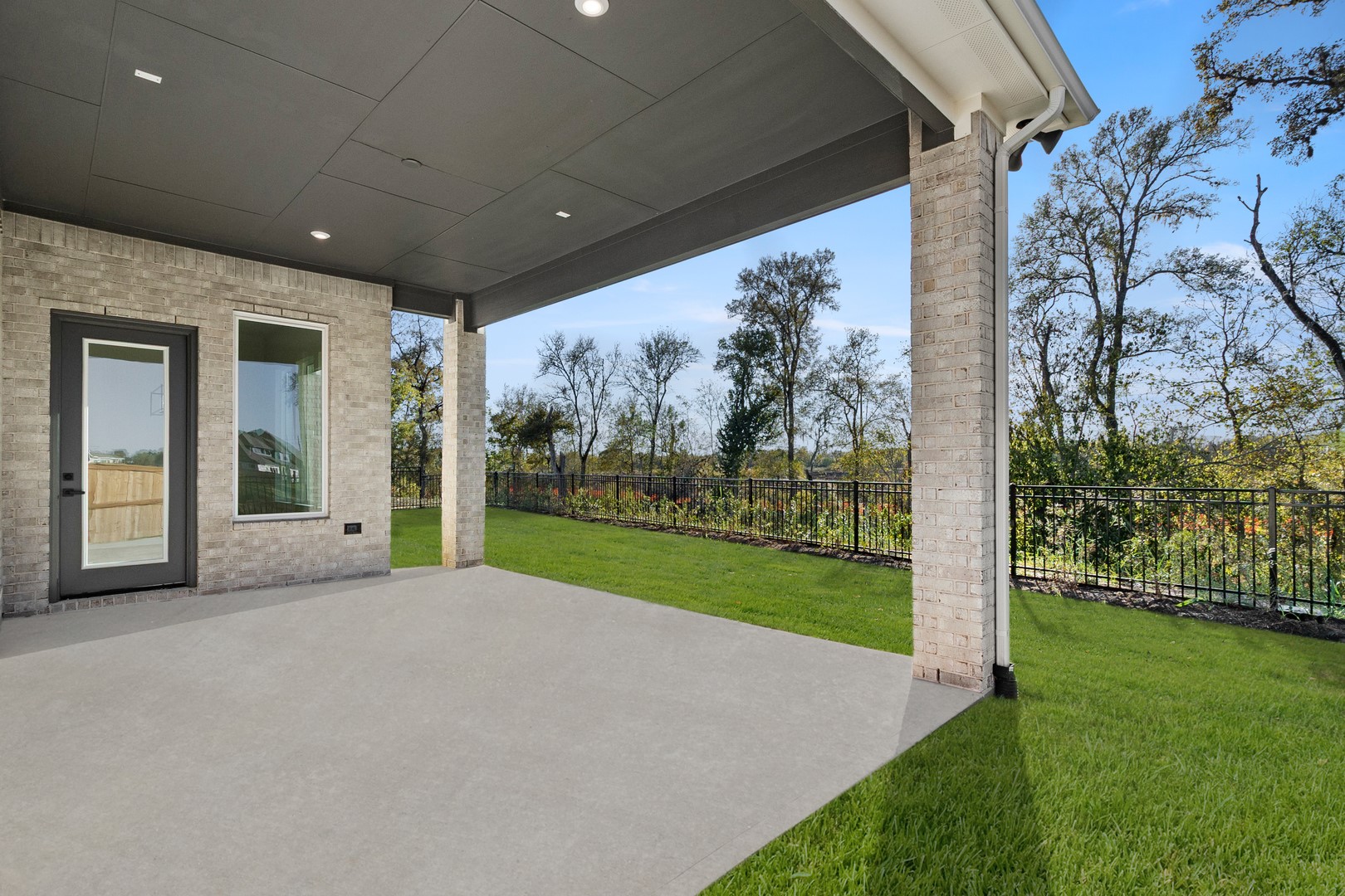 7914 Blue Dasher Pk Place Fulshear, TX 77441 - Photo 30 of 30 a view of a porch with a yard and garden
