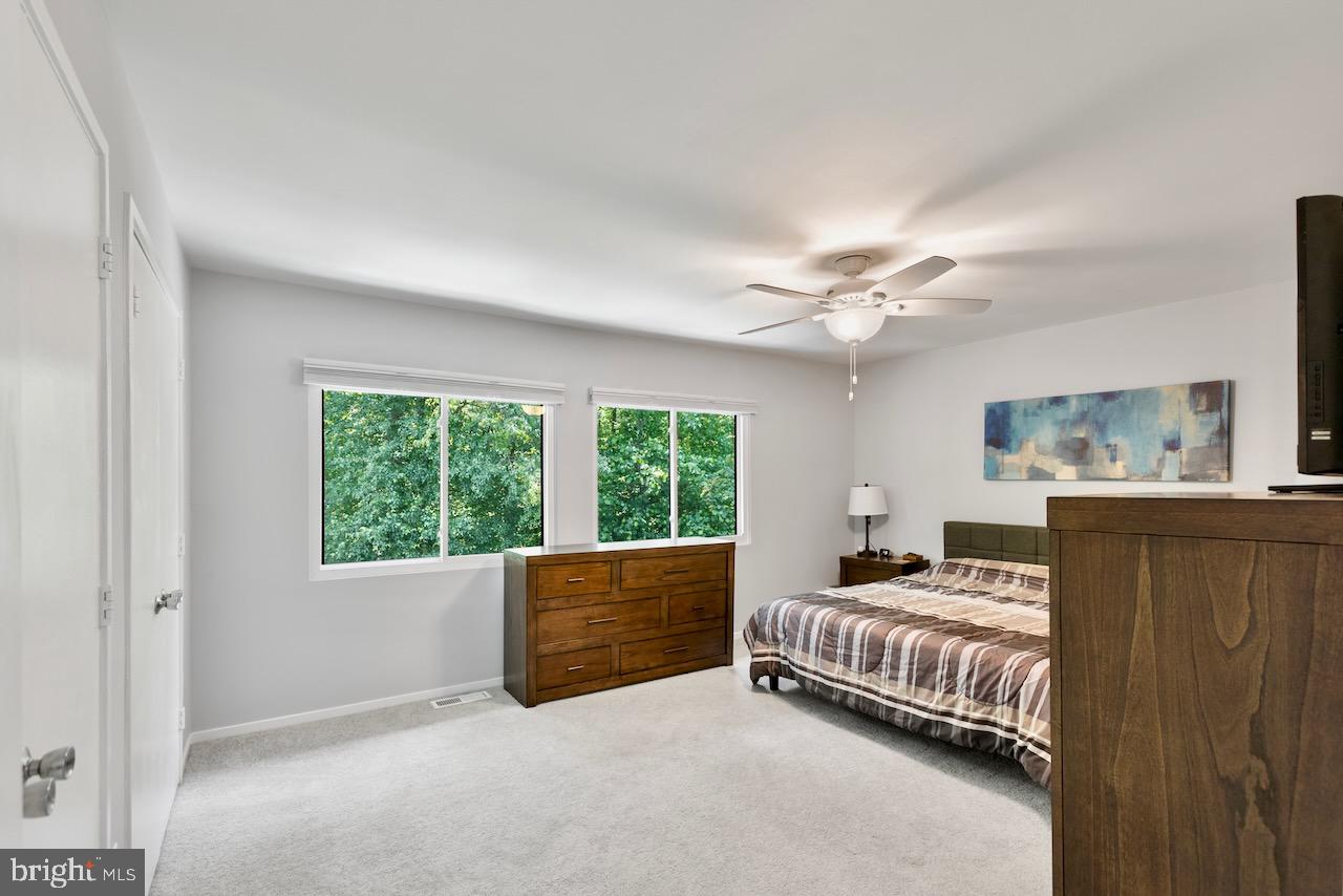 2224 Wheelwright Court Reston, VA 20191 - Photo 15 of 32 a bedroom with bed and window