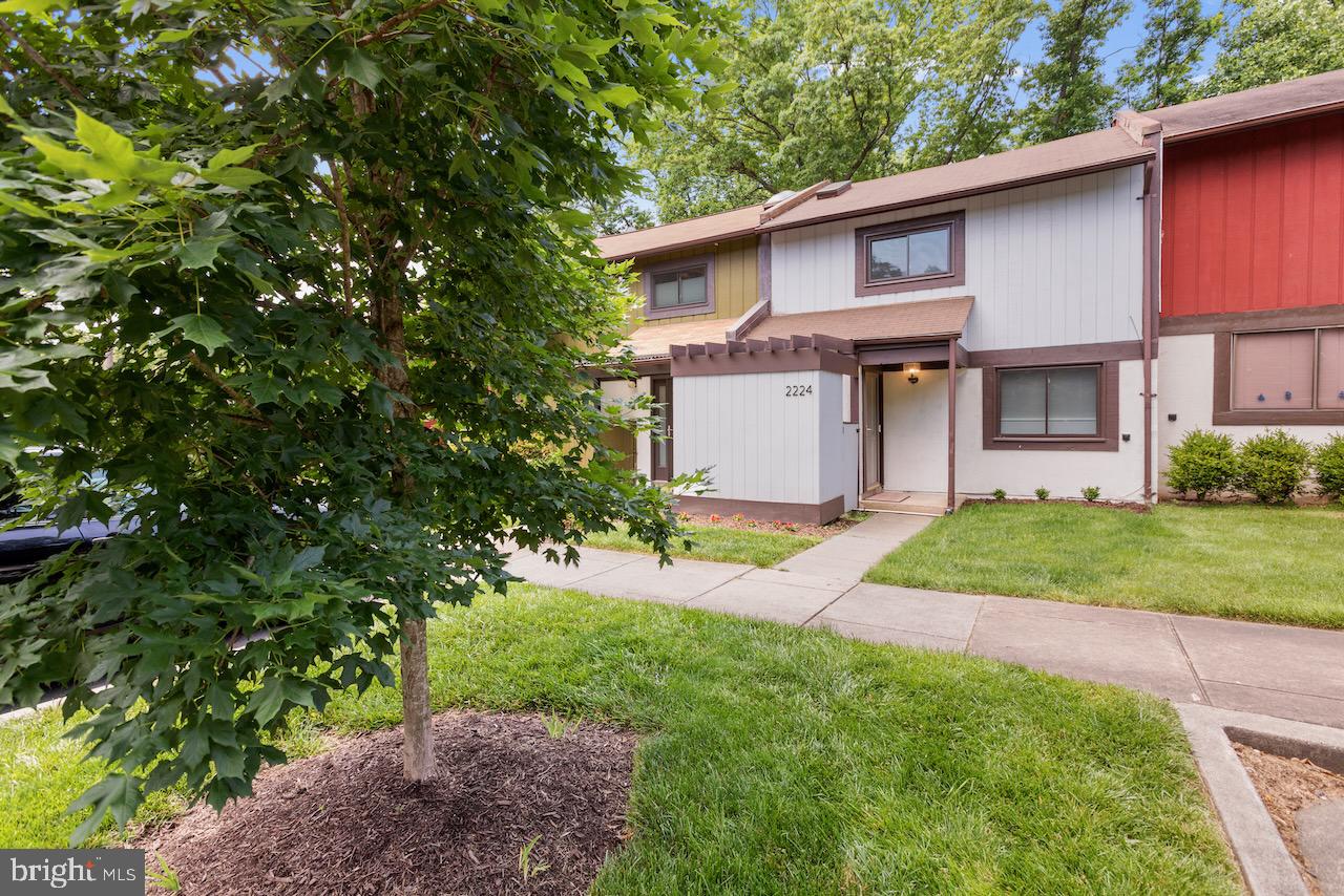 2224 Wheelwright Court Reston, VA 20191 - Photo 2 of 32 a view of a house with a yard