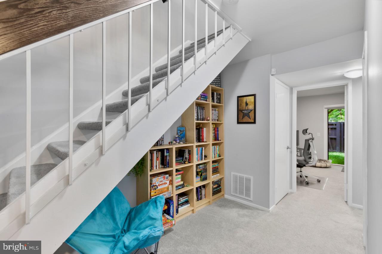 2224 Wheelwright Court Reston, VA 20191 - Photo 23 of 32 a view of staircase with white walls and stairs