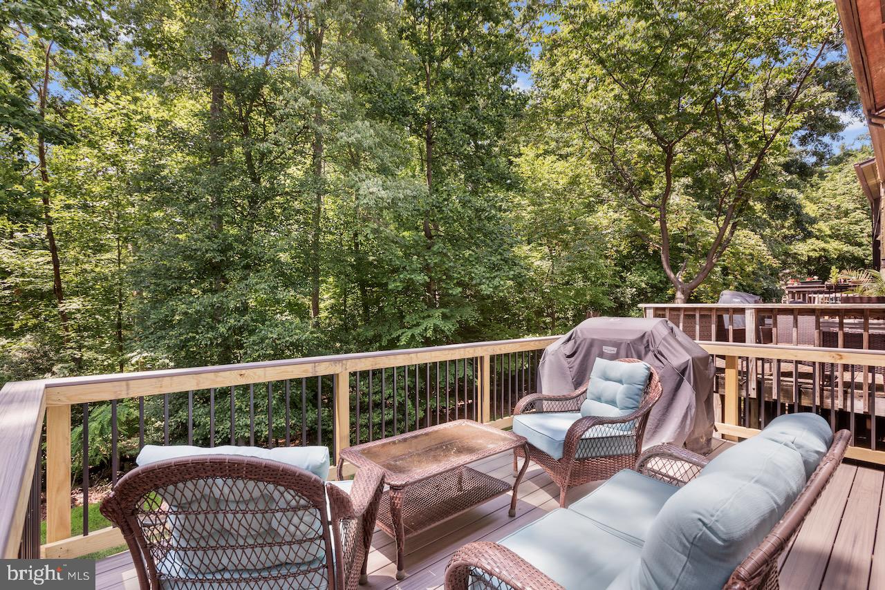 2224 Wheelwright Court Reston, VA 20191 - Photo 29 of 32 a view of a two chairs in the deck