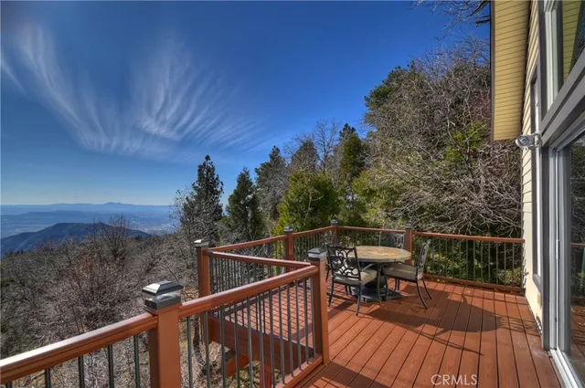 a view of a balcony with chairs