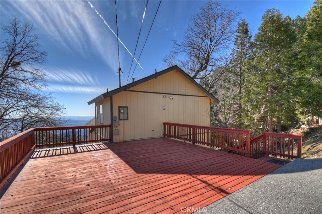 2477 Spring Oak Drive Running Springs, CA 92382 - Photo 3 of 51 a view of a wooden deck