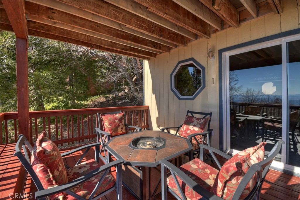 2477 Spring Oak Drive Running Springs, CA 92382 - Photo 39 of 51 a view of a chairs and table in the terrace