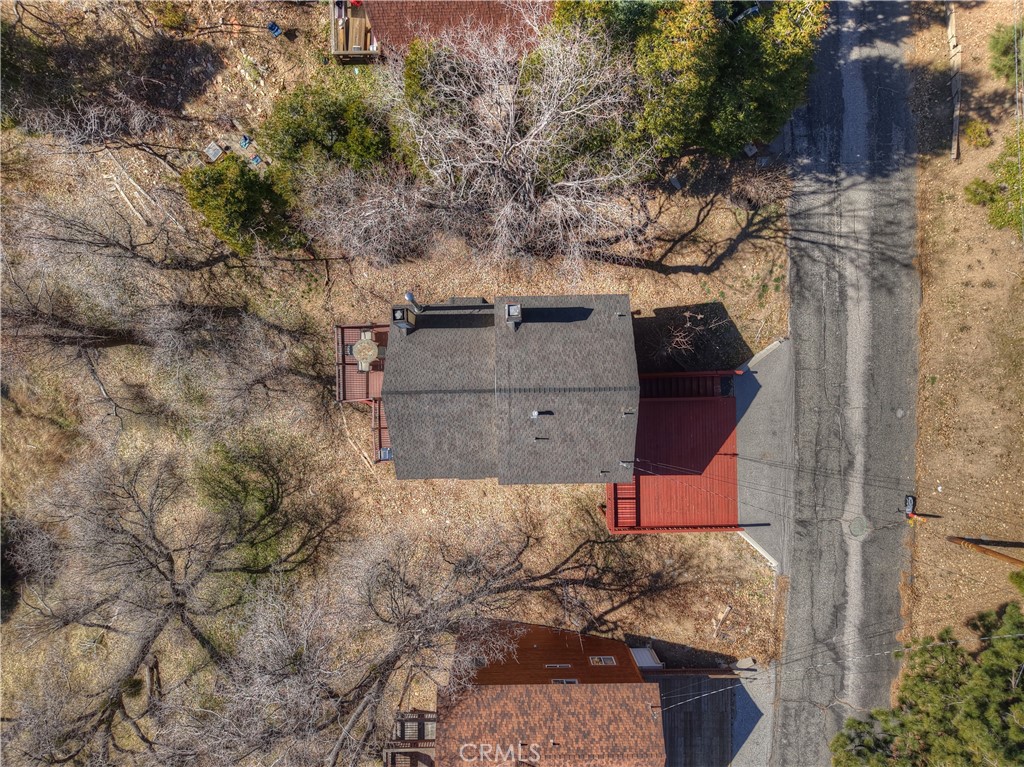2477 Spring Oak Drive Running Springs, CA 92382 - Photo 44 of 51 an aerial view of a house with a yard