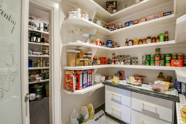 a cabinet with shelves and a book shelf