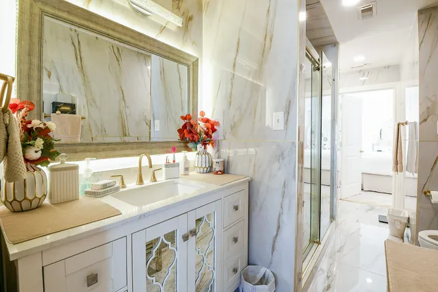 a bathroom with a sink and a mirror