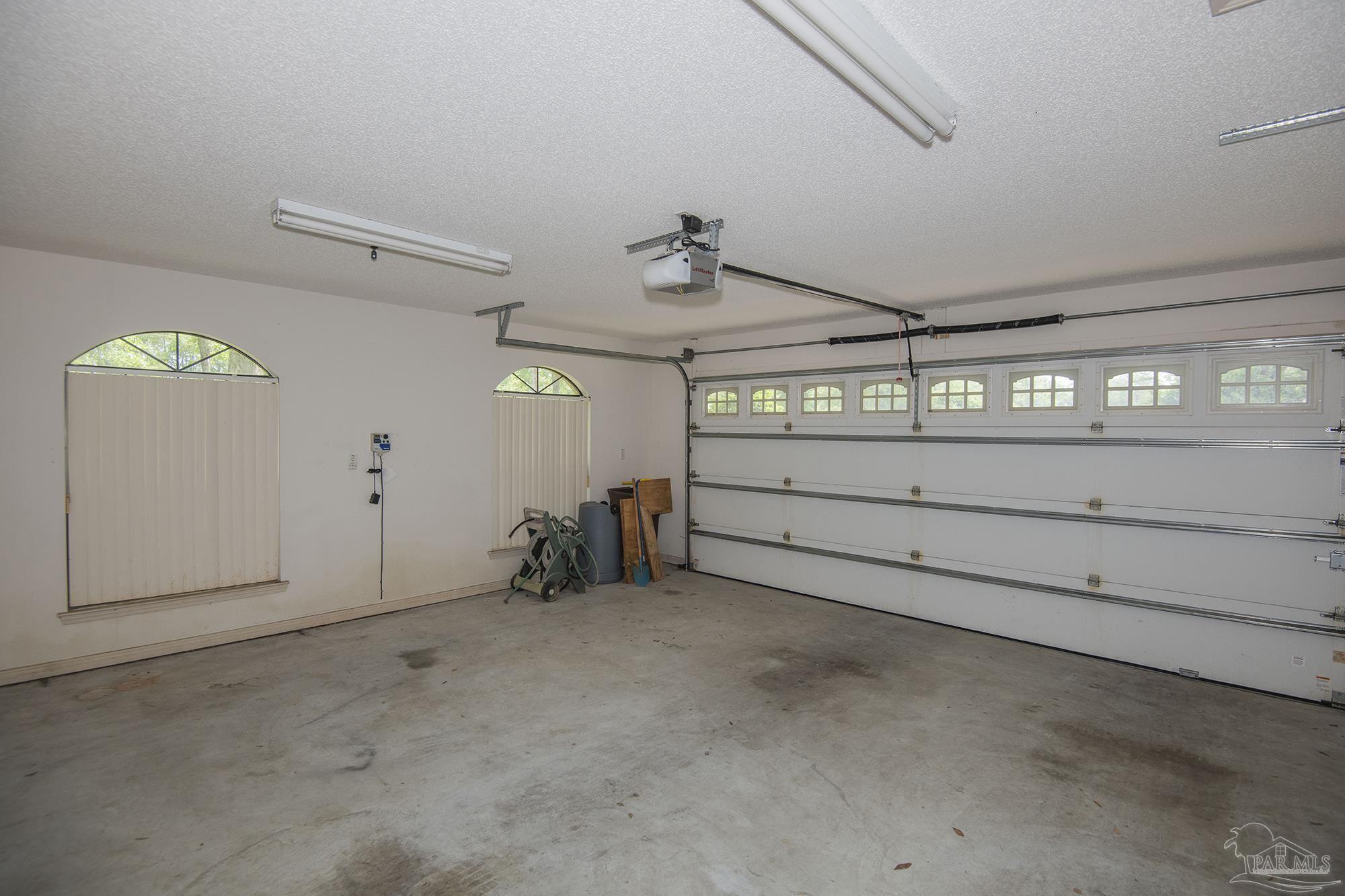 4565 South Spencer Field Road Pace, FL 32571 - Photo 47 of 49 a view of a garage