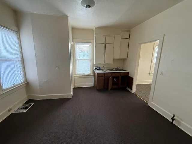 a view of a room with washing machine