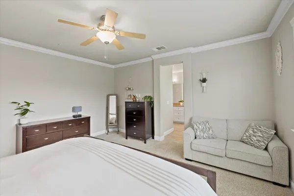 a spacious bathroom with a granite countertop sink a mirror and shower