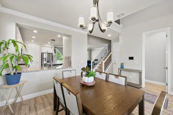a view of entryway with wooden floor