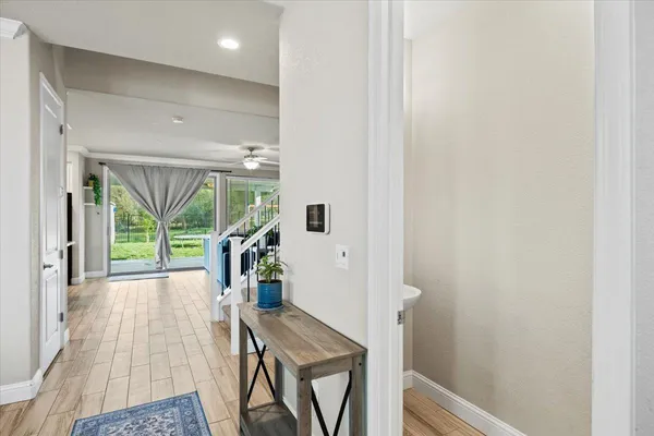 a view of entryway with wooden floor