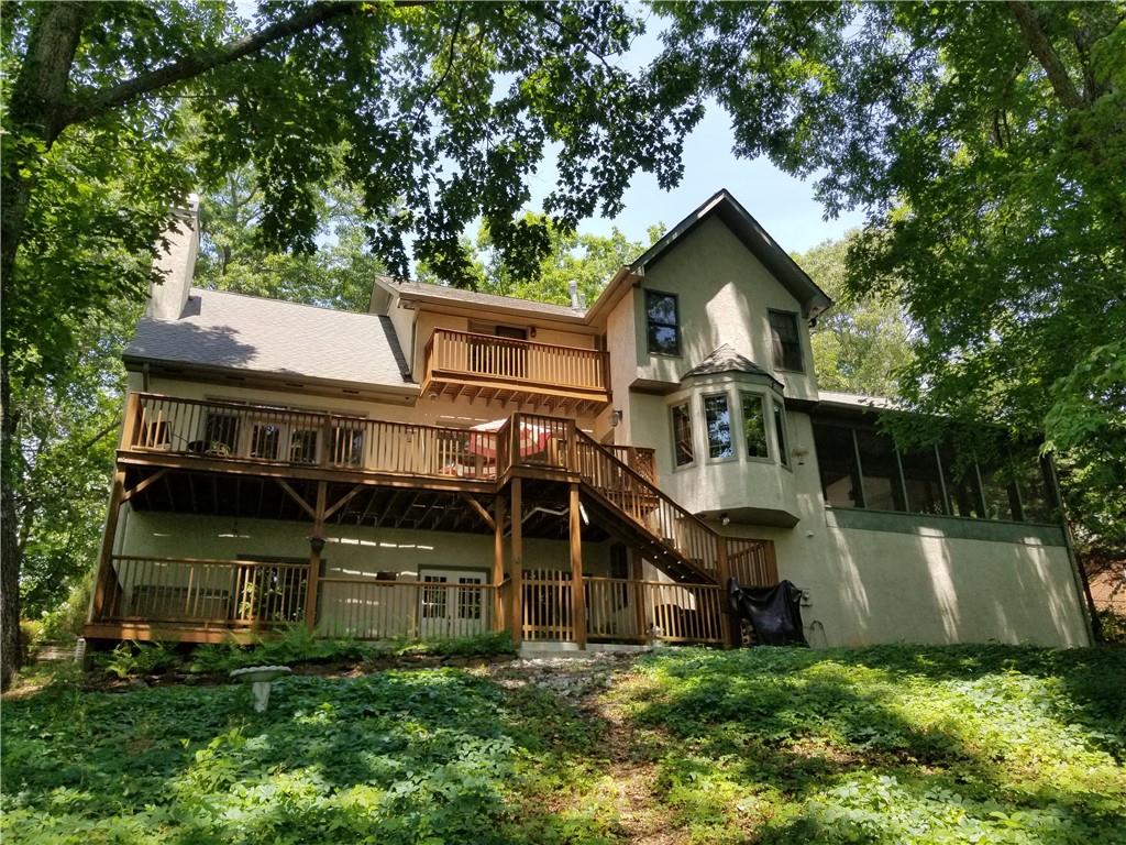 155 Spring Drive Roswell, GA 30075 - Photo 1 of 1 Back view of home in Summer