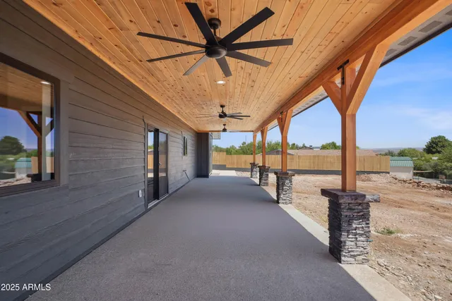 a view of a porch with furniture