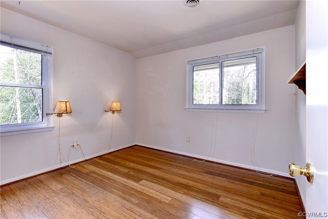 130 Cooley Road Williamsburg, VA 23188 - Photo 15 of 30 a view of a room with wooden floor and small window