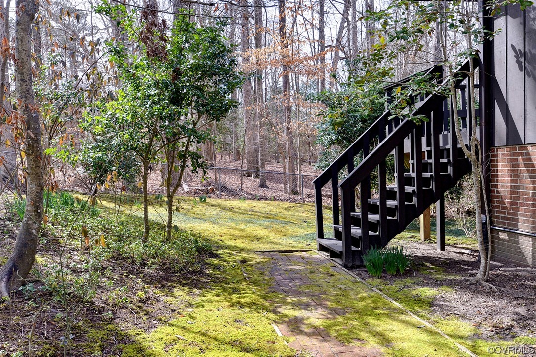 130 Cooley Road Williamsburg, VA 23188 - Photo 24 of 30 a view of an house with backyard and trees