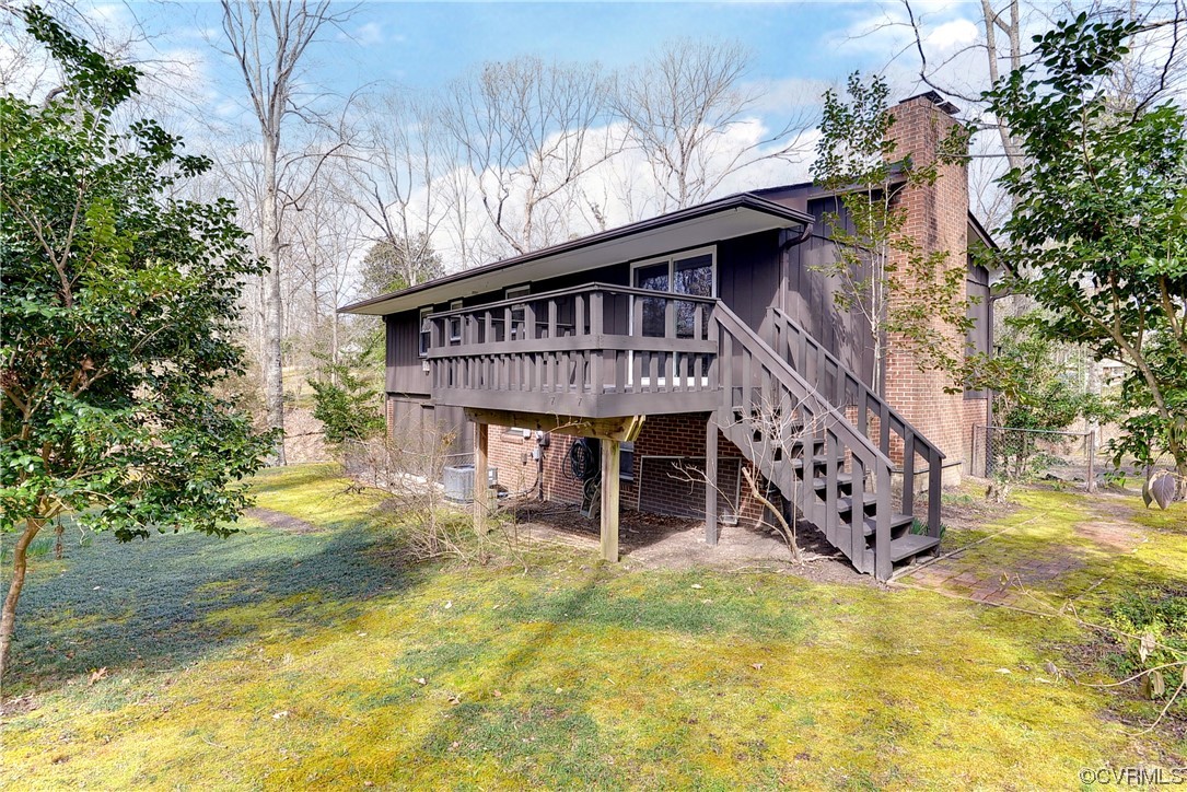 130 Cooley Road Williamsburg, VA 23188 - Photo 29 of 30 a view of a house with a yard patio and deck