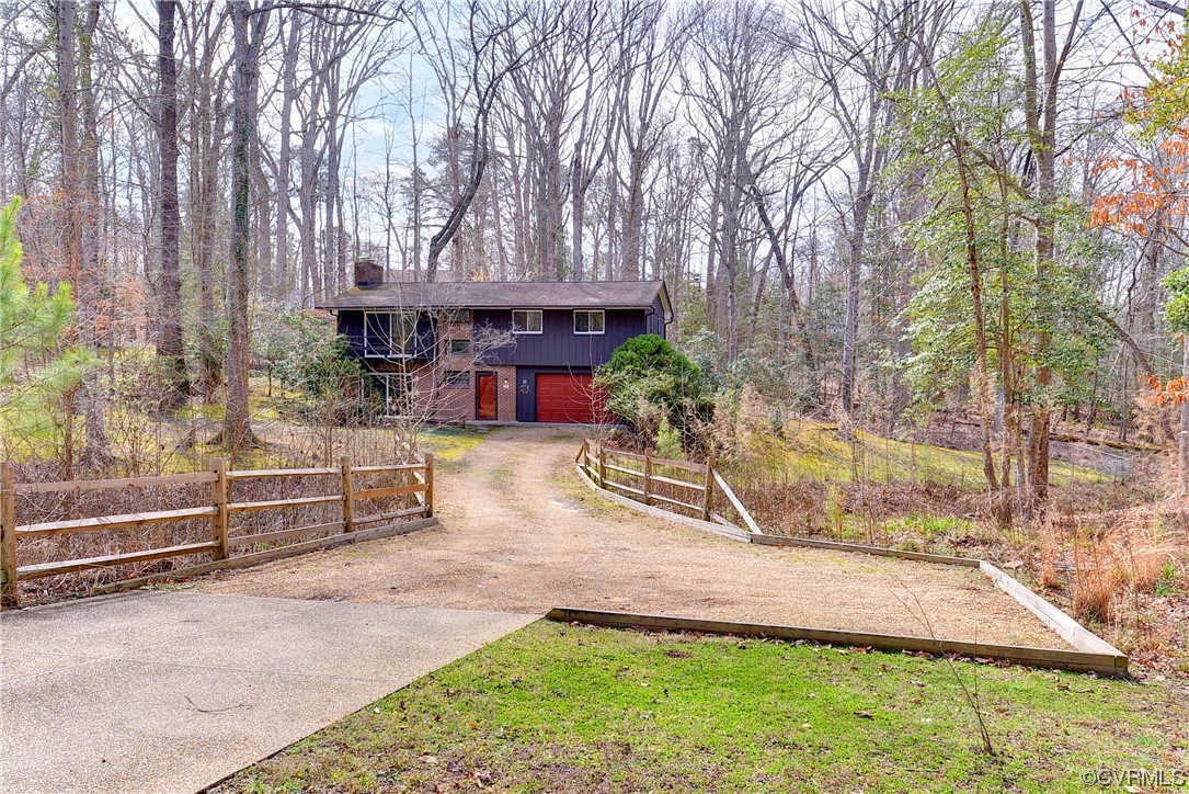 130 Cooley Road Williamsburg, VA 23188 - Photo 30 of 30 a view of backyard with outdoor seating and plants