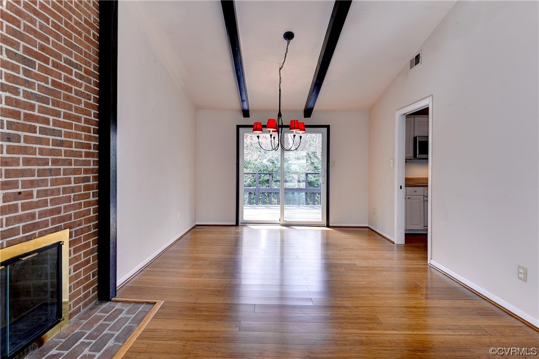 130 Cooley Road Williamsburg, VA 23188 - Photo 4 of 30 wooden floor in an empty room with a window